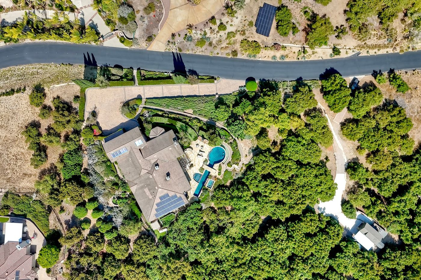 Top-down aerial of the 3.61-acre ridge lot at 2484 Dos Lomas