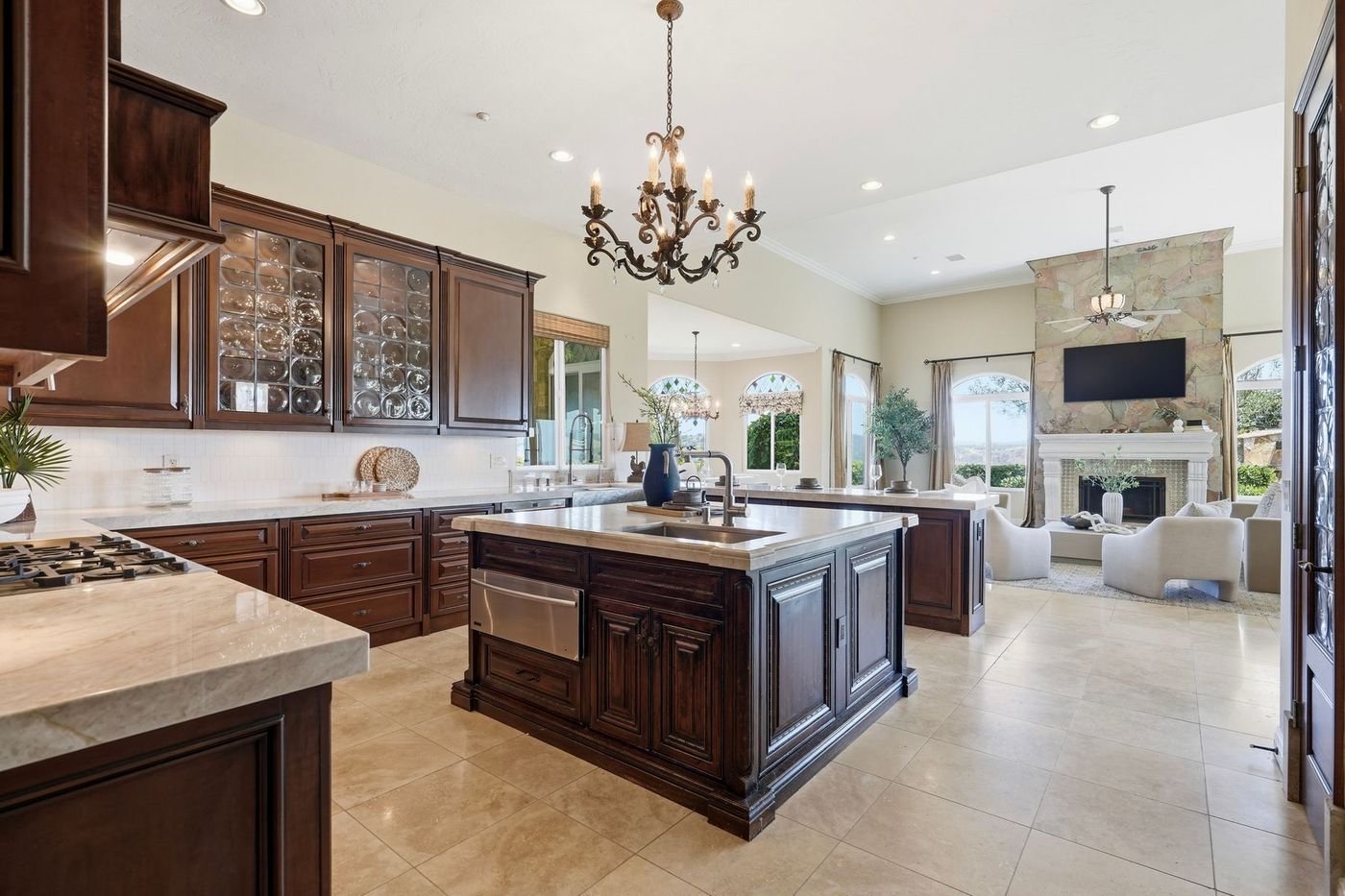Twin-island kitchen opening to the great room