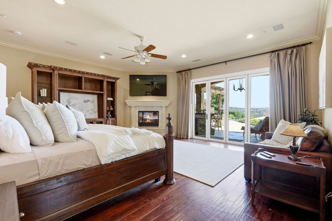 Primary sleeping chamber with cast-stone fireplace